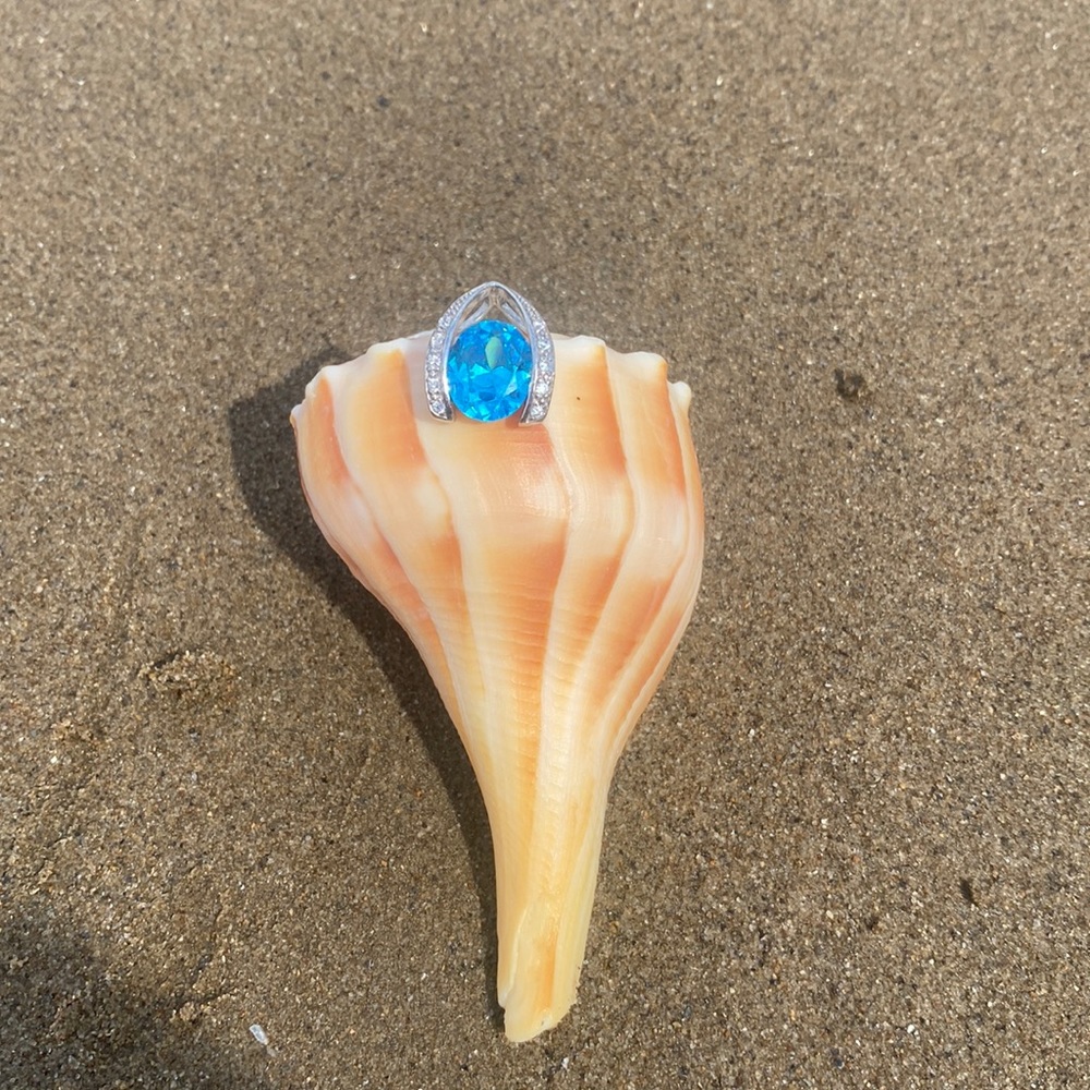 Light Blue Stone With Crystals Pendant